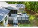 Expansive back deck with screened-in porch is perfect for outdoor gatherings and enjoying nature views at 6026 Belle Meade Ct, Villa Rica, GA 30180