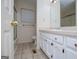 Bathroom showcasing white cabinets and vanity area at 6026 Belle Meade Ct, Villa Rica, GA 30180
