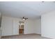 Bright bedroom with neutral carpet and open bathroom with wooden vanity at 6026 Belle Meade Ct, Villa Rica, GA 30180