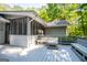Multi-level deck area with integrated benches and access to a screened porch at 6026 Belle Meade Ct, Villa Rica, GA 30180