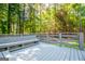 Spacious deck area with built-in benches, perfect for gatherings at 6026 Belle Meade Ct, Villa Rica, GA 30180