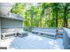 Open-air deck area featuring built-in benches, perfect for outdoor relaxation and entertaining at 6026 Belle Meade Ct, Villa Rica, GA 30180