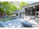 Expansive backyard deck features built-in benches and access to the screened in porch at 6026 Belle Meade Ct, Villa Rica, GA 30180