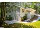 Rear elevation shows access to a basement and upper porch, plus a secluded yard at 6026 Belle Meade Ct, Villa Rica, GA 30180