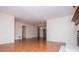 Open living area with laminate flooring, a chandelier, and sliding glass doors at 6026 Belle Meade Ct, Villa Rica, GA 30180