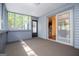 Screened porch shows a view to the outside and access to inside at 6026 Belle Meade Ct, Villa Rica, GA 30180