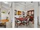 Dining room with classic accents, a wooden table, and a view into the kitchen at 3206 Abbott Dr # 12, Powder Springs, GA 30127