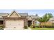 Charming brick home with well-maintained landscaping, a two-car garage, and a welcoming front porch at 3206 Abbott Dr # 12, Powder Springs, GA 30127