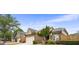 Attractive exterior view of a brick home featuring a two-car garage and lush green lawn at 3206 Abbott Dr # 12, Powder Springs, GA 30127