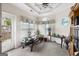 Bright bonus room with many windows that offer natural light and views of the backyard at 3206 Abbott Dr # 12, Powder Springs, GA 30127