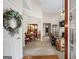 Inviting entryway showcasing a formal dining room and a spacious living area with fireplace at 3206 Abbott Dr # 12, Powder Springs, GA 30127