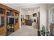 Open living area featuring neutral carpeting and paint, fireplace, and view of the dining room at 3206 Abbott Dr # 12, Powder Springs, GA 30127