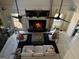 Cozy living room features a fireplace, ceiling fans, and seating area at 4786 Carlene Sw Way # Iv, Lilburn, GA 30047