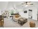 Spacious living room with ceiling fans and a large sectional perfect for relaxing and entertaining at 4786 Carlene Sw Way # Iv, Lilburn, GA 30047