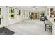 Bright sunroom featuring natural light, wood-look flooring, and sauna at 4786 Carlene Sw Way # Iv, Lilburn, GA 30047