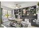 Stylish study featuring custom built-in shelving, hardwood floors, and natural light at 4786 Carlene Sw Way # Iv, Lilburn, GA 30047
