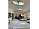 Bright sunroom with skylights, a ceiling fan, and dining area at 4786 Carlene Sw Way # Iv, Lilburn, GA 30047