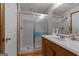 Bathroom with glass-enclosed shower and vanity at 6605 Old White Mill Rd, Fairburn, GA 30213