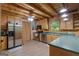 Well-equipped kitchen with stainless steel appliances, wood cabinets, and a functional layout for cooking at 6605 Old White Mill Rd, Fairburn, GA 30213