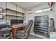Compact office space with ample desk space, storage and natural light from window and air conditioning unit at 150 Whitney Way, Fayetteville, GA 30214