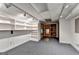 Finished basement features carpet flooring, built-in shelving, and recessed lighting at 1486 Maple Ridge Dr, Suwanee, GA 30024