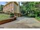 Brick two-story home with attached garage and well-manicured lawn at 1486 Maple Ridge Dr, Suwanee, GA 30024