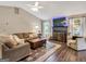 Bright living room with a fireplace, cozy seating, and a stylish rug creating a welcoming atmosphere at 105 Carols Ln, Locust Grove, GA 30248