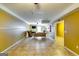Open basement layout with tile flooring and a comfortable seating area to relax at 1373 Fall River Dr, Conyers, GA 30013