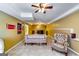 Finished basement featuring tile floor, fan, and comfortable seating area at 1373 Fall River Dr, Conyers, GA 30013
