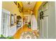 Bright foyer featuring hardwood floors, high ceilings, a staircase, and elegant decorative accents at 1373 Fall River Dr, Conyers, GA 30013