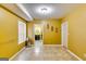 Inviting living space with tile flooring, natural light, and entryways to rooms at 1373 Fall River Dr, Conyers, GA 30013