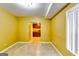 Cozy living space with tile flooring and an entryway into the kitchenette at 1373 Fall River Dr, Conyers, GA 30013