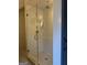 Modern shower featuring subway tile, a frameless glass enclosure, and stylish fixtures at 10583 Serenbe Ln, Palmetto, GA 30268