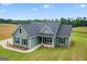 Beautifully landscaped one-story home with well-kept lawn on a sunny day at 123 Oak Road, Locust Grove, GA 30248
