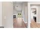Bright living room showcasing hardwood floors, a fireplace, and access to a patio at 123 Oak Road, Locust Grove, GA 30248