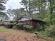 Charming brick home with mature trees and landscaping, offering a serene and private setting at 4720 Ben Hill Rd, South Fulton, GA 30349
