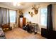 Spacious bedroom with natural light, a TV, and comfortable furnishings at 361 N Dogwood Ave, Social Circle, GA 30025