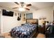 Comfortable bedroom with ceiling fan and natural light at 361 N Dogwood Ave, Social Circle, GA 30025