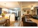 Open dining area flowing into the kitchen and living room, perfect for entertaining at 361 N Dogwood Ave, Social Circle, GA 30025