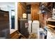 A functional laundry room with white washer and dryer units at 361 N Dogwood Ave, Social Circle, GA 30025