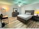 Bedroom featuring gray walls, wood flooring, and matching gray furniture at 142 Kylee Ct, Villa Rica, GA 30180