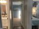 Hallway view through to bedroom and bathroom showcasing the home's interior layout at 324 Bells Ferry Ne Rd, White, GA 30184