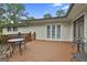 Cozy backyard deck provides ample space for seating and enjoying the outdoors, with an entrance to the house at 502 Pine Cir, Peachtree City, GA 30269