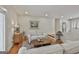Cozy living room with neutral furniture and hardwood floors at 502 Pine Cir, Peachtree City, GA 30269