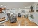 Spacious living room with multiple seating areas and a fireplace at 502 Pine Cir, Peachtree City, GA 30269