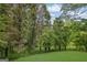 View of mature trees from the back of the property showing the privacy offered at 2795 Hawthorne Dr, Atlanta, GA 30345