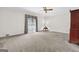 Spacious bedroom with neutral carpet, crown molding, and a window with decorative valance at 2795 Hawthorne Dr, Atlanta, GA 30345