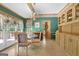 Charming breakfast nook featuring a glass table, bright windows, and built-in storage for casual dining at 2795 Hawthorne Dr, Atlanta, GA 30345