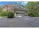 Spacious two-car garage adjacent to a driveway, offering convenient parking and storage options at 2795 Hawthorne Dr, Atlanta, GA 30345