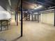Spacious unfinished basement with support beams and visible ductwork for storage at 120 Rolling Brook Trl, Fayetteville, GA 30215